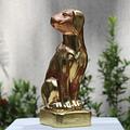 Estatuilla Marron de Perro con lamina de oro
